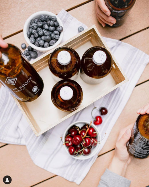 picnic with organic cherries, blueberries and healthy hooch kombucha